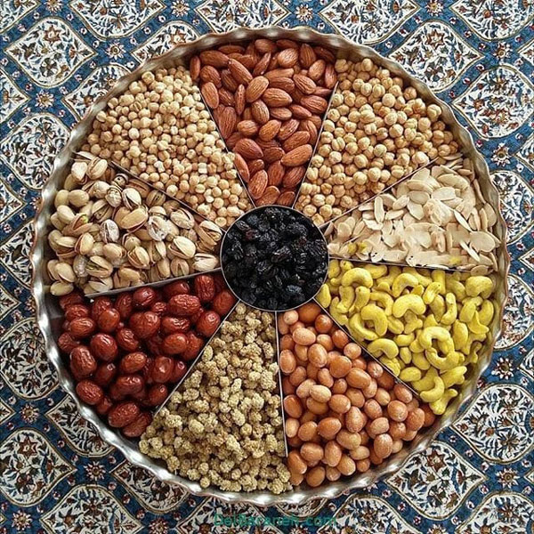 تزیین آجیل ساده و شیک تزیین آجیل در تنگ شیشه ای تزیین اجیل در منزل آموزش تزیین آجیل شب یلدا برای عروس تزیین آجیل با مقوا تزیین آجیل با تور