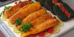 تزیین ماهی سرخ شده مجلسی با برنج و لیمو ترش در دیس